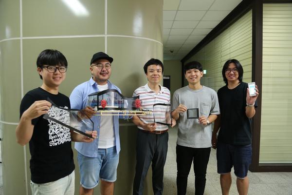 The Liquid Crystal team group picture, from left, Master student Yung-Yuan Lin, PhD student Heng-Yi Tseng, Distinguished Professor Tsung-Hsien Lin, PhD student Cheng-Chang Li and Master student Zheng-Zhi Huang.