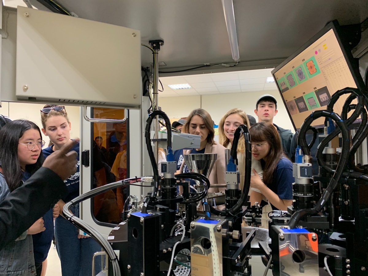 Students observing the machinery