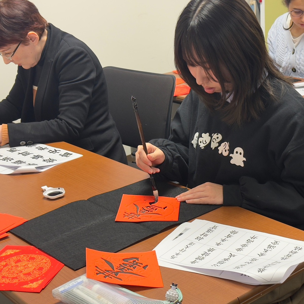 Spring couplet calligraphy activity.Image