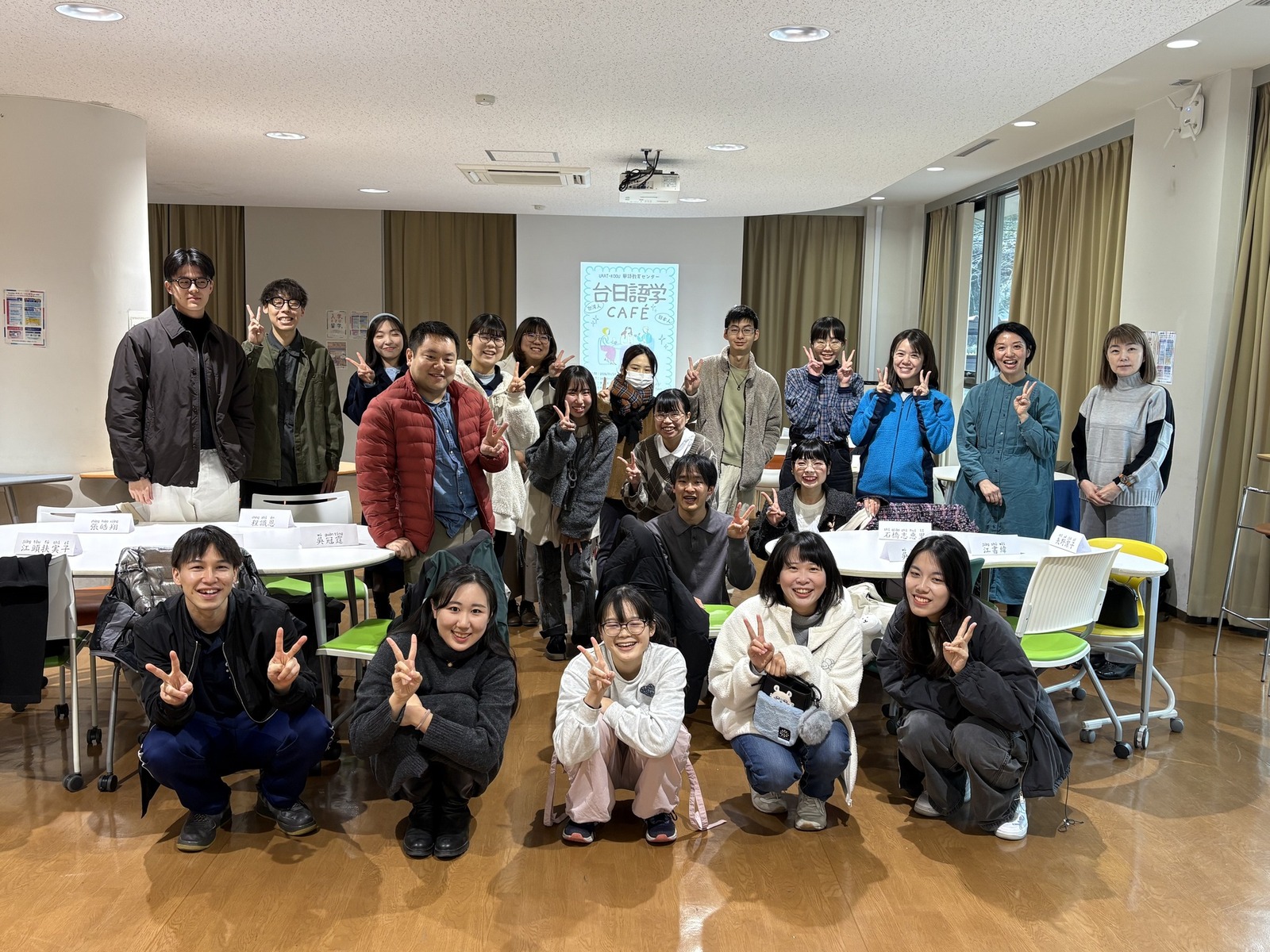 Taiwanese and Japanese student language exchange café at Kumamoto University.Image