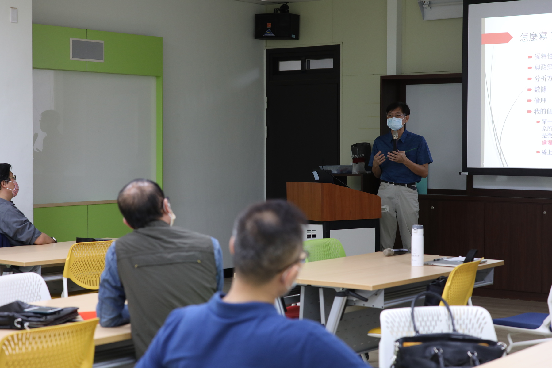 Teachers discuss project writing skills for teaching practice research in workshopImage