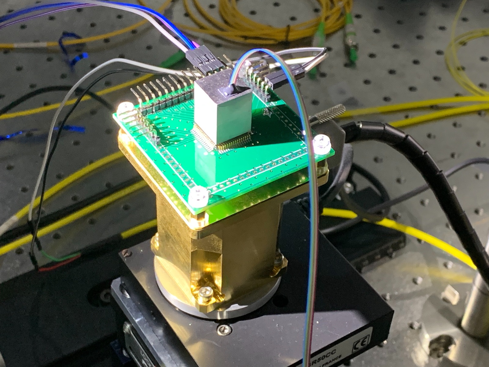 New solution of advanced positioning technology: millimeter-size Si photonics fiber optics gyroscope chip