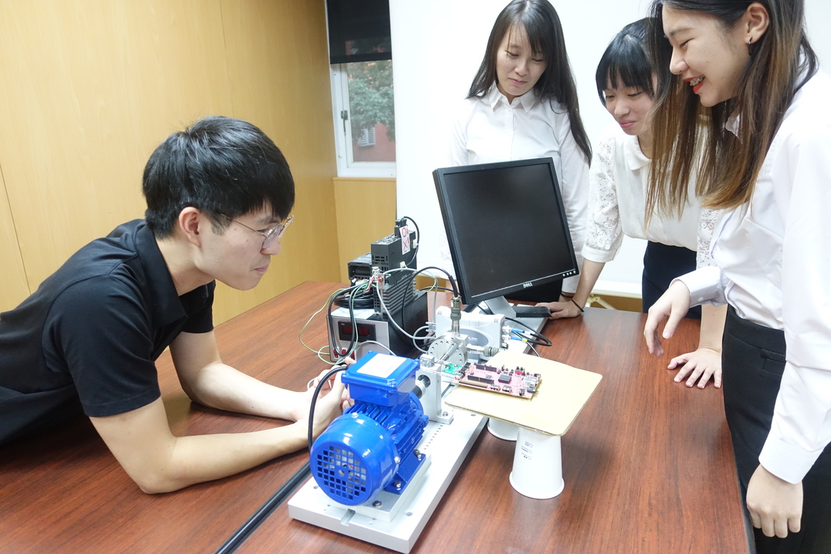 The students engaged in design and R&D.Image
