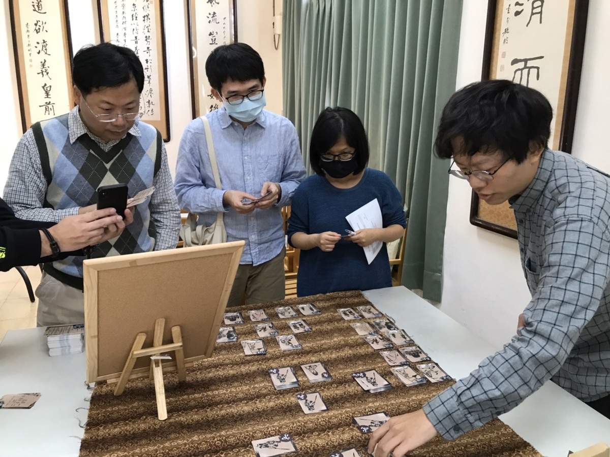 The students and teachers test board games designed by the students