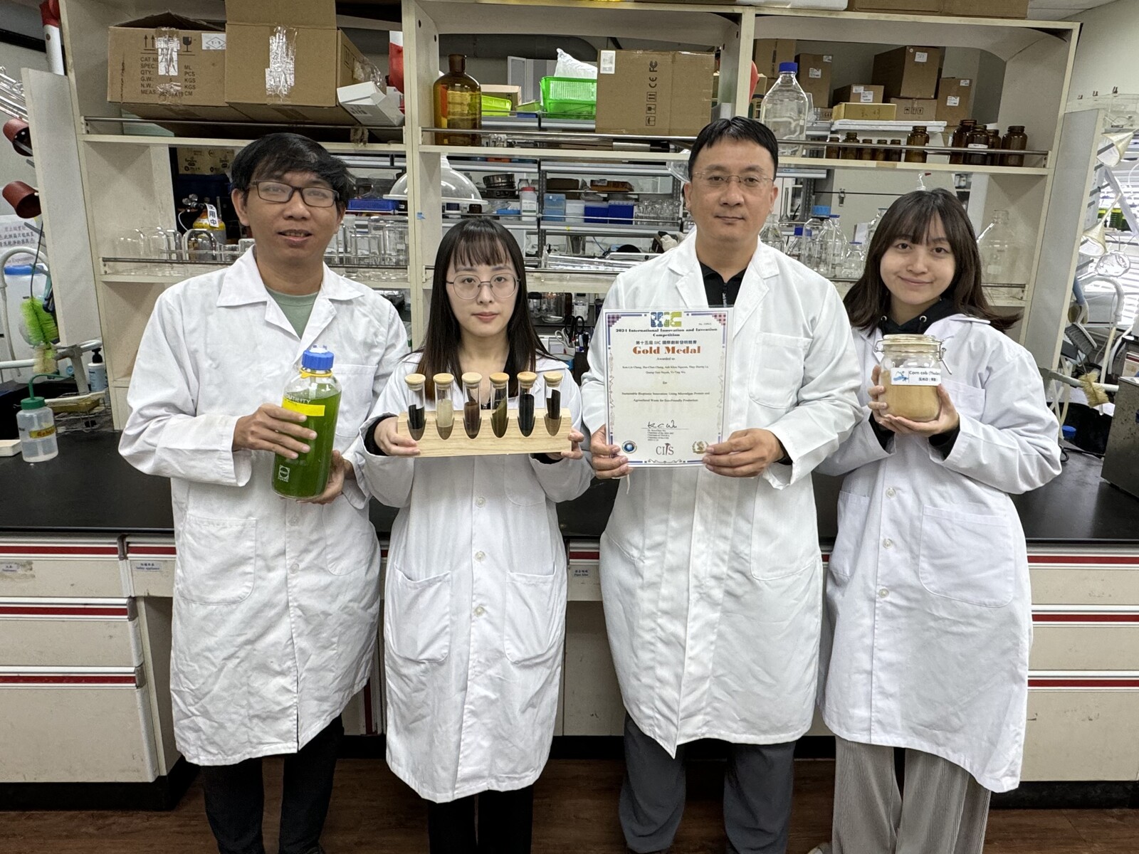 Group photo of Professor Ken-Lin Chang's research team from the Institute of Environmental Engineering at National Sun Yat-sen University. From left: Vietnamese PhD student Quang Tam Huynh, Master's student Yi-Ting Wu, Professor Ken-Lin Chang, and Master's student Hui-Chun Chang.