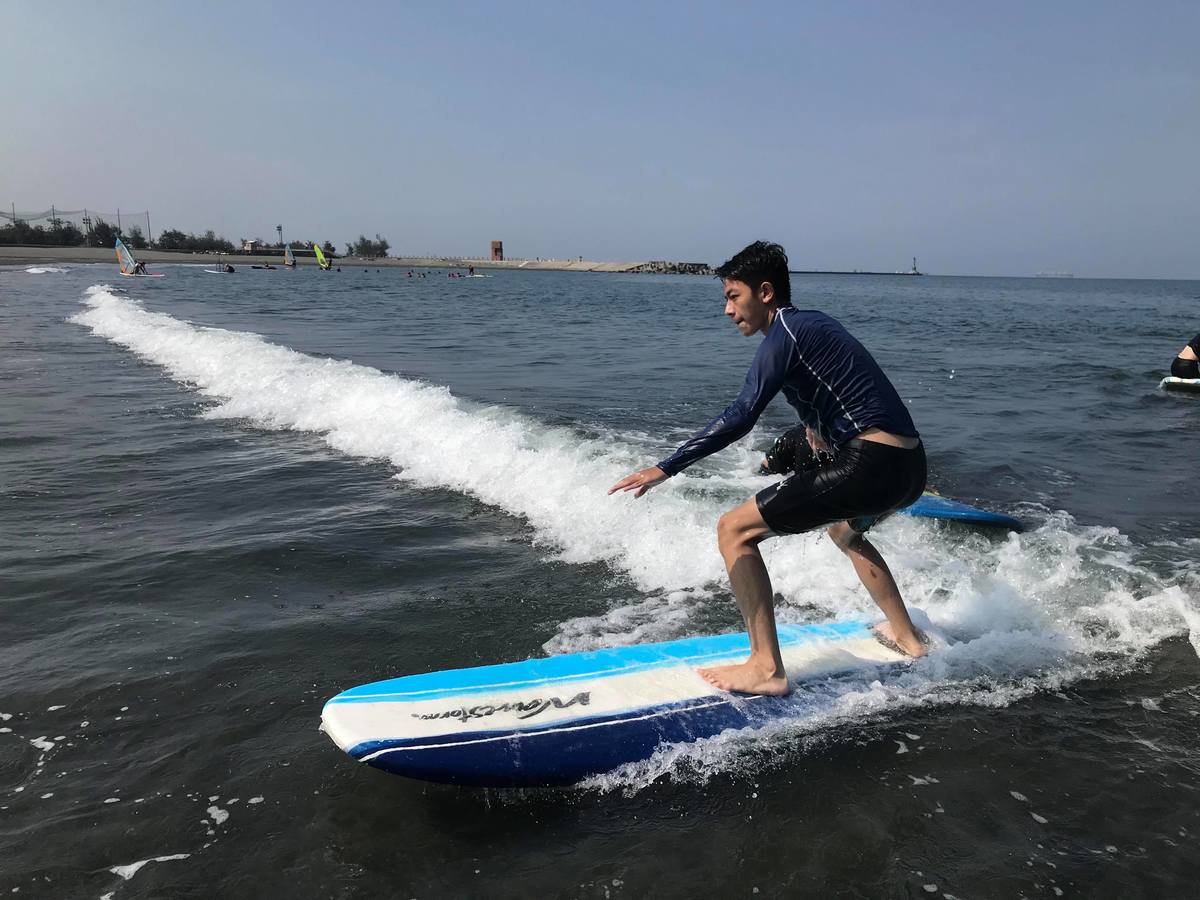Learn to surf and pay your tuition by collecting trash on the beachImage