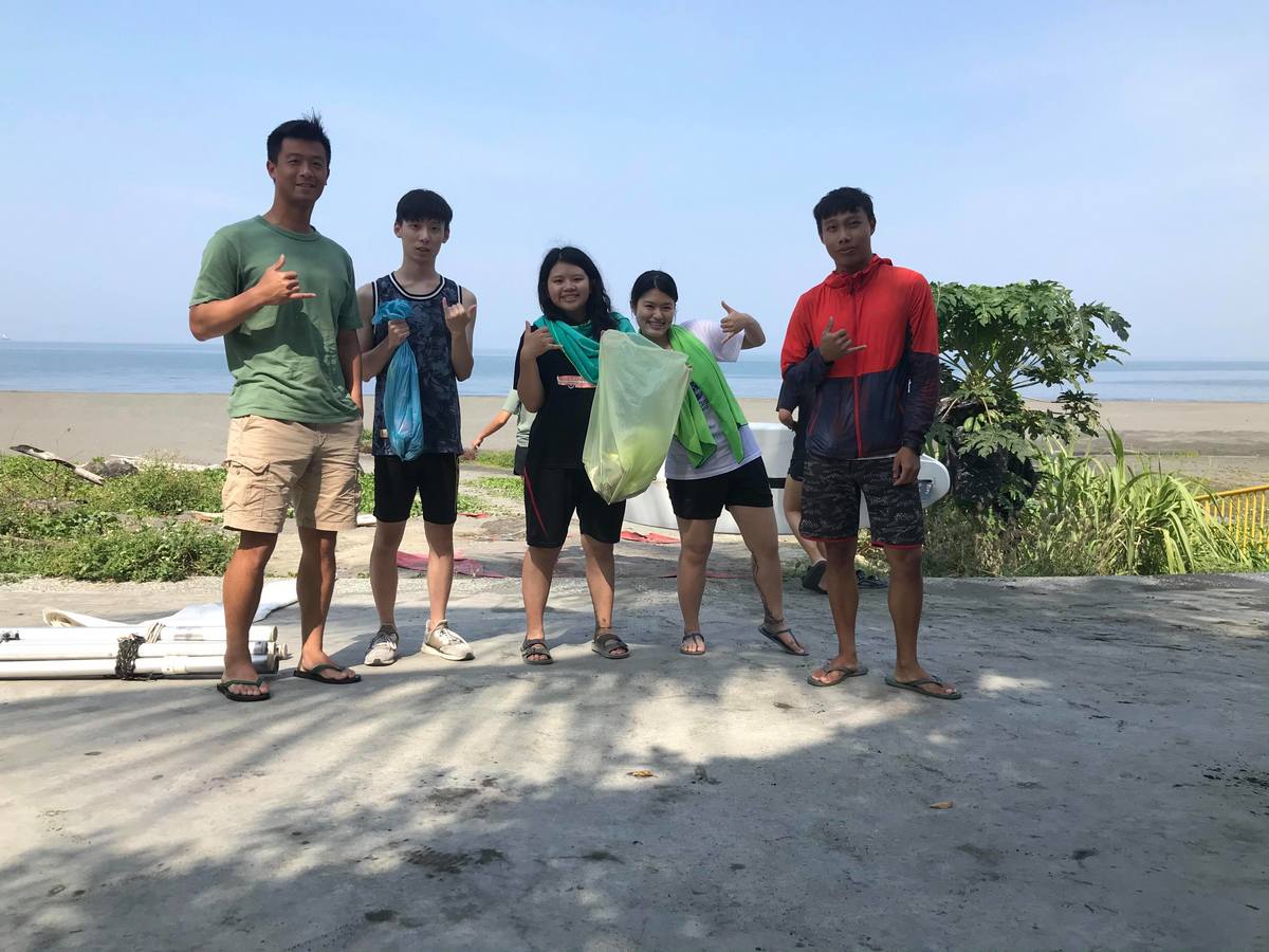 Learn to surf and pay your tuition by collecting trash on the beachImage