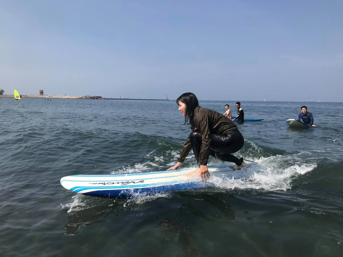 Learn to surf and pay your tuition by collecting trash on the beachImage
