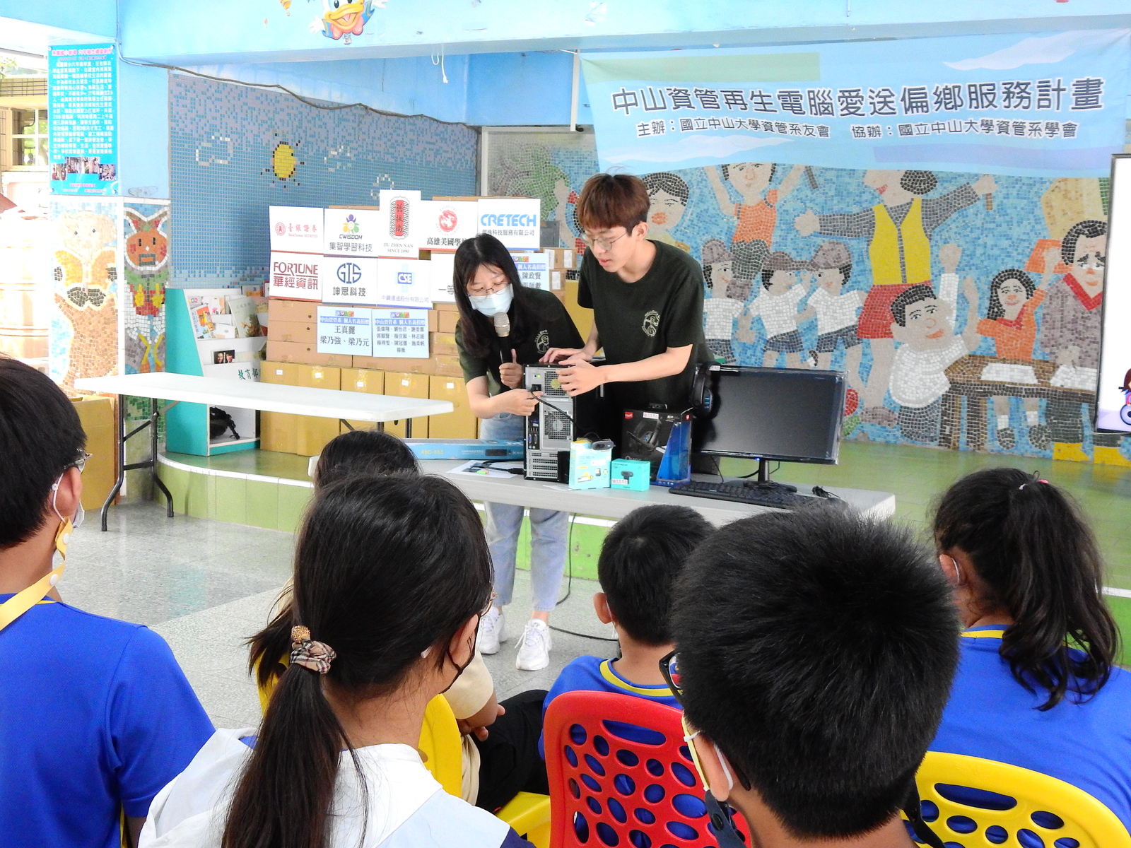 The volunteers demonstrated how to install computers