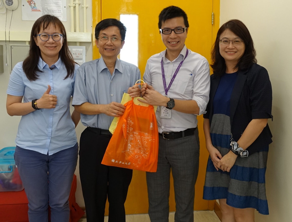 Visit to TWGHs Chen Zao Men College in Hong Kong. From the left are: Chia-Chen Hung of the Office of Academic Affairs, NSYSU Vice President for Academic Affairs Tsung-Lin Lee, teacher Wong Chi Chung of the TWGHs Chen Zao Men College in Hong Kong, Director Chloe Hsieh of the NSYSU Office of Academic Affairs.