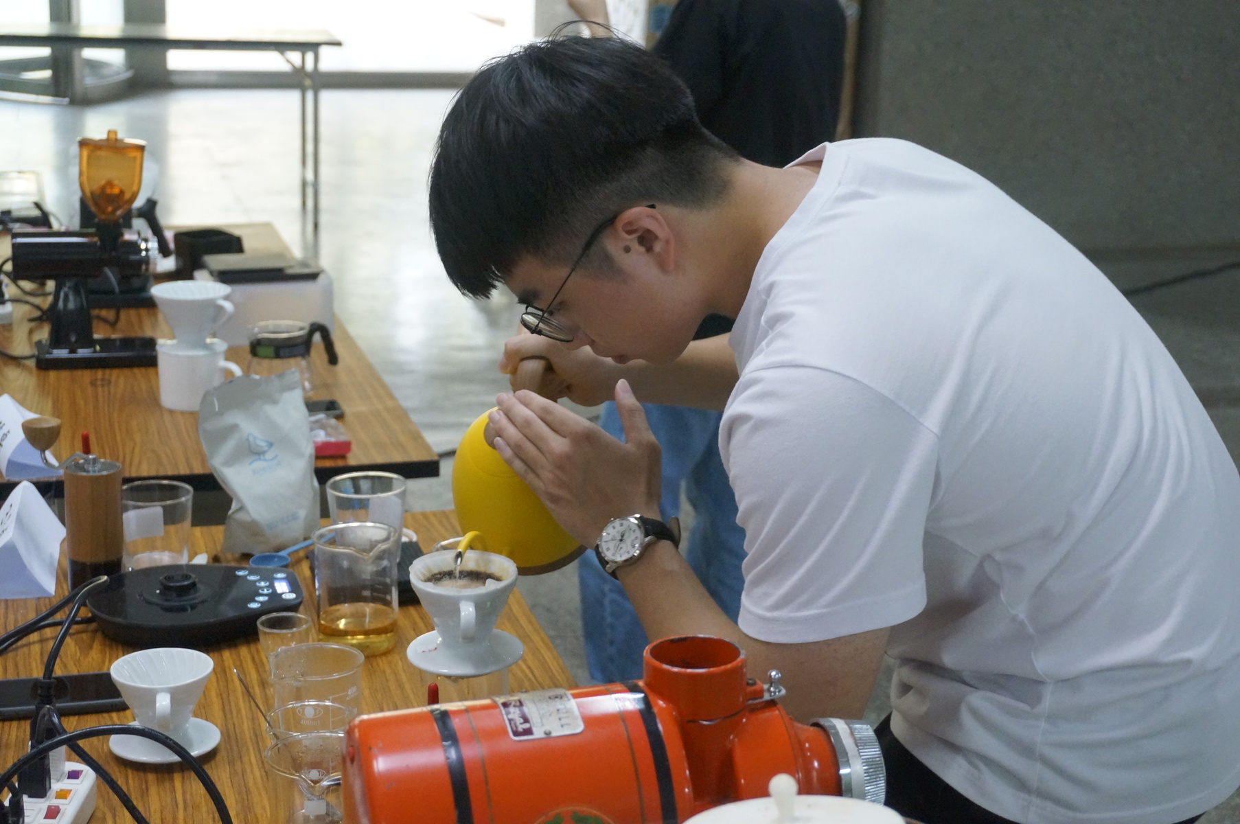 Yi-Hao Su was chosen to represent the team and brew coffee on stage.Image