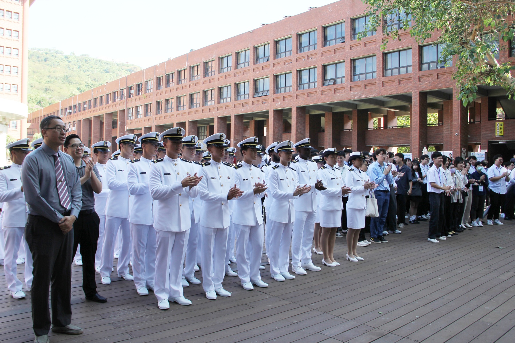 Students from the R.O.C. Naval Academy and NSYSU jointly participate in the opening ceremony.Image