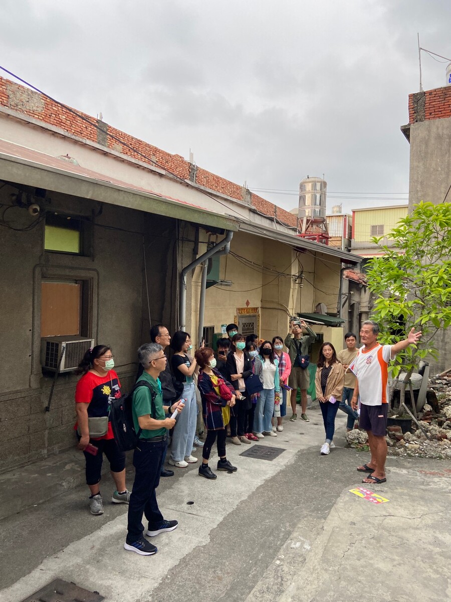 A resident guiding a tour