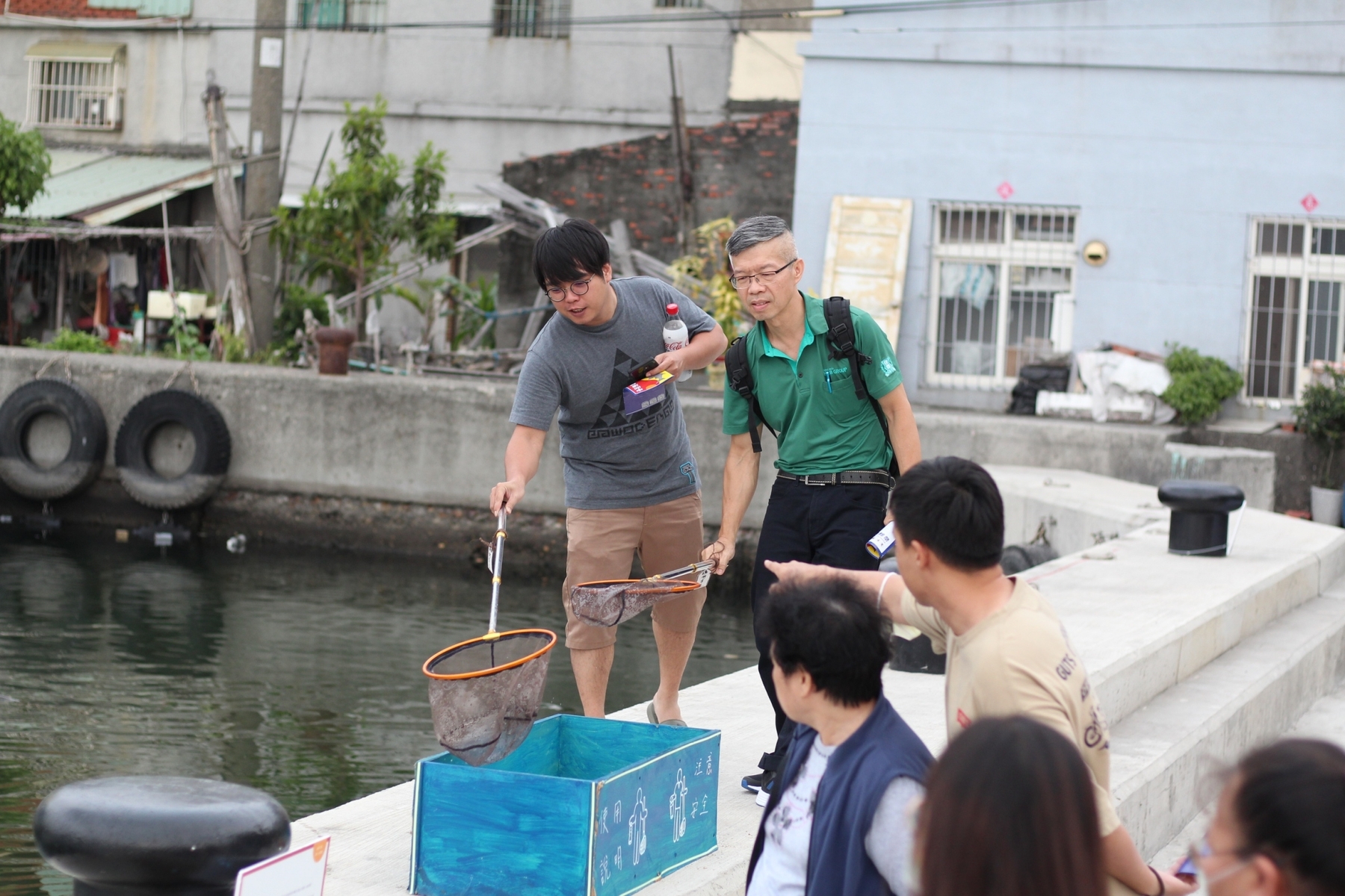 Festival visitors fishing for ocean wasteImage