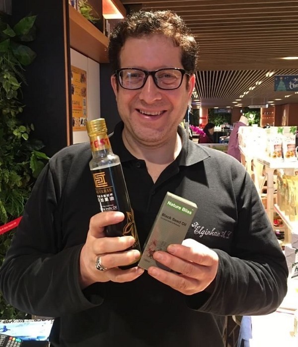 Yavuz Avci, first international alumnus of NSYSU and graduate of Financial Management program, is a successful importer of food and health products from his native Turkey (photo provided by Yavuz Avci)Image