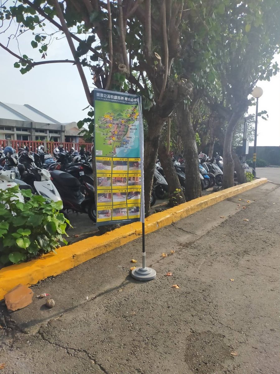 Temporary parking areas for food deliverers are marked with special flags.