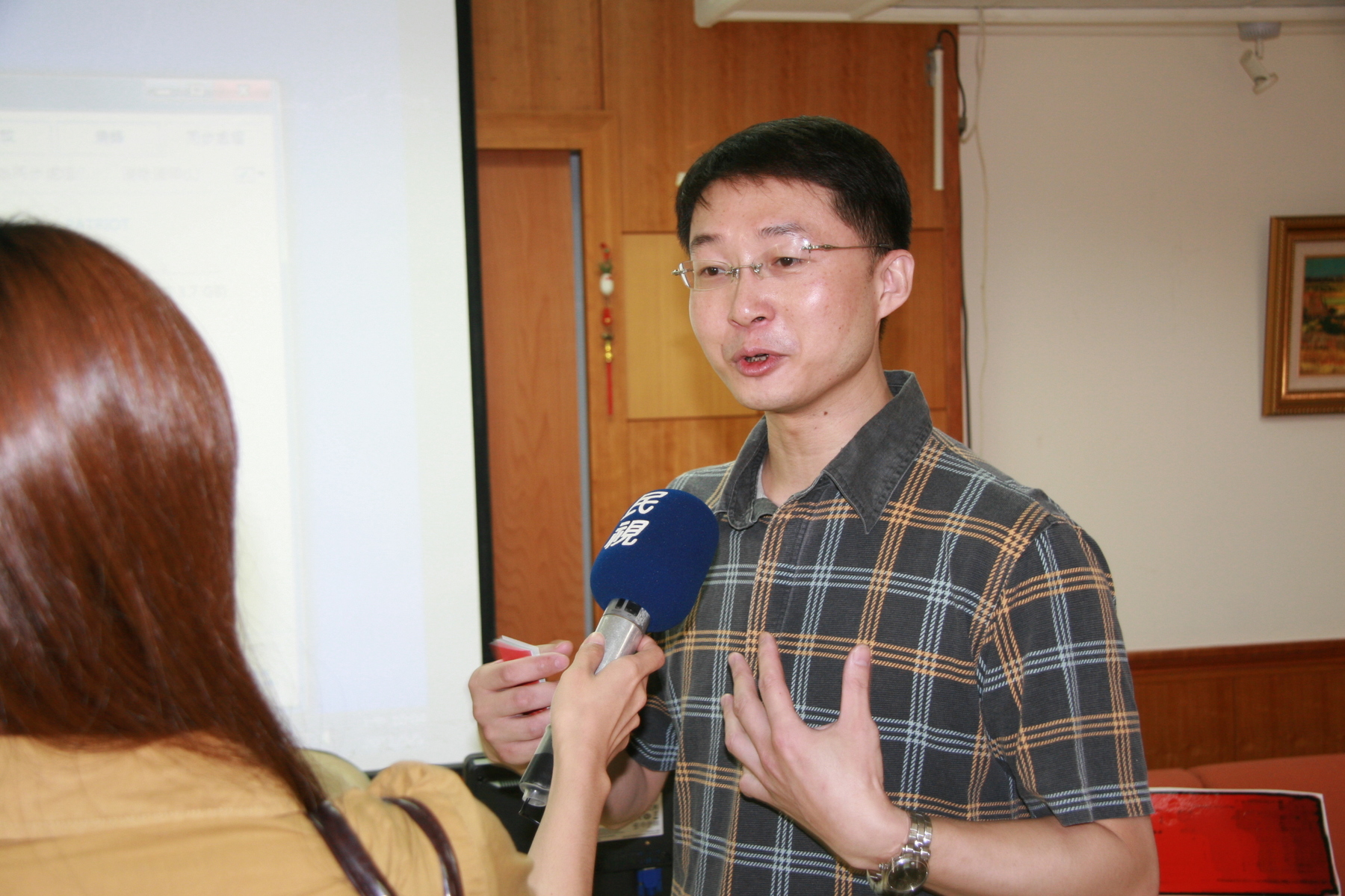 邱文彬老師接受採訪圖片