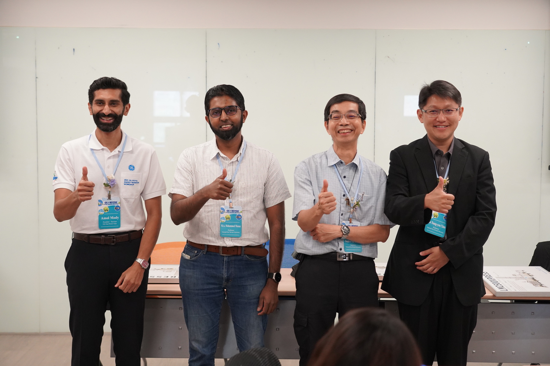 Group photo of NSYSU faculties and the GE representatives. (From the left of the photo) Amol Mody, the President of Services at GE Gas Power Asia, M.A. Mohammed Manaz, the Assistant Professor of the Department of Electrical Engineering, San-Pui Lam, the Professor of the Institute of Public Affairs Management, and Ian Tsung-yen Chen, the Associate Professor of the Institute of Political Science at NSYSU.