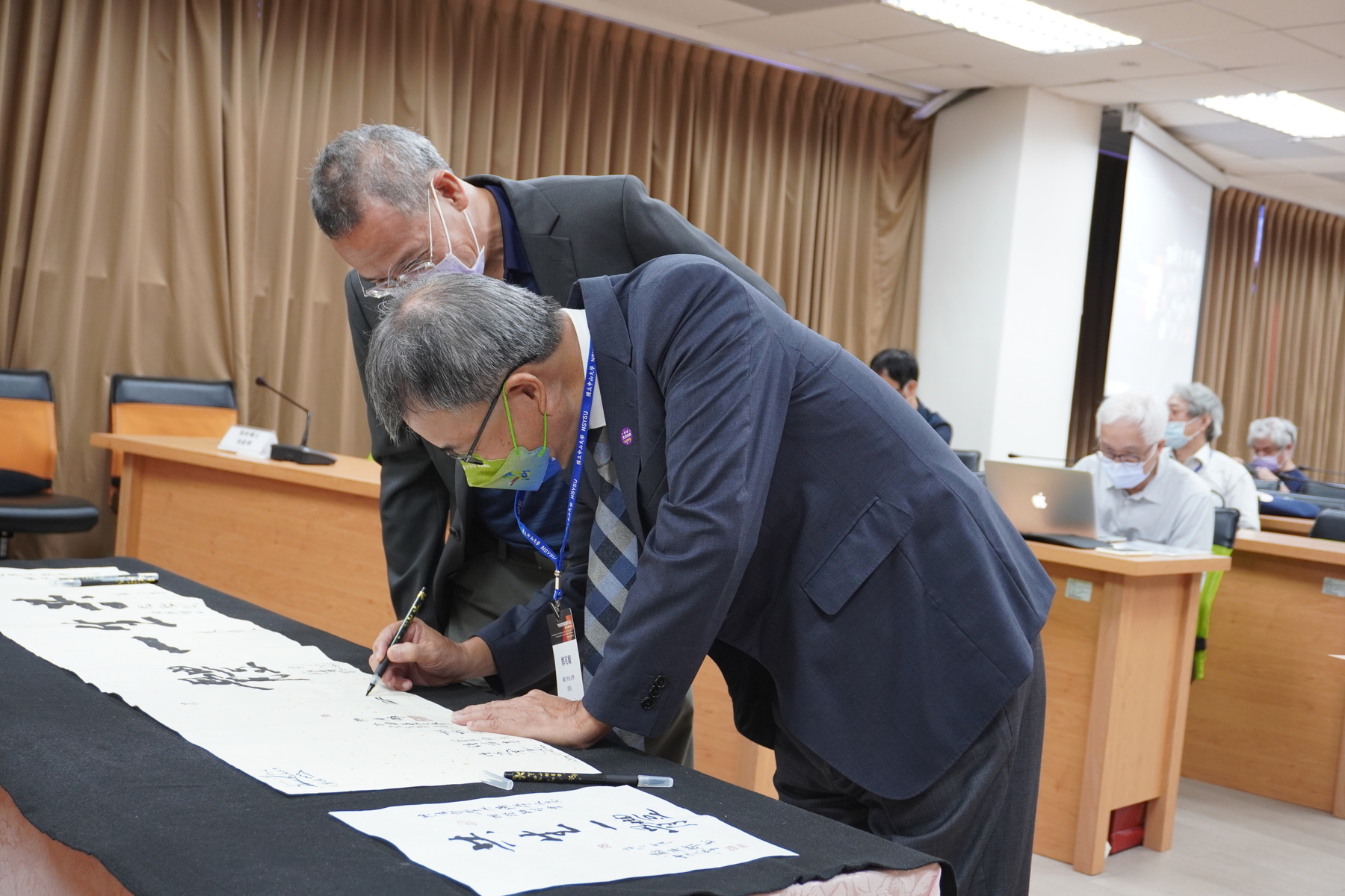 NSYSU President Ying-Yao Cheng graced the conference with his own calligraphy, writing the characters “Co-becoming as One” to celebrate the opening of the conference