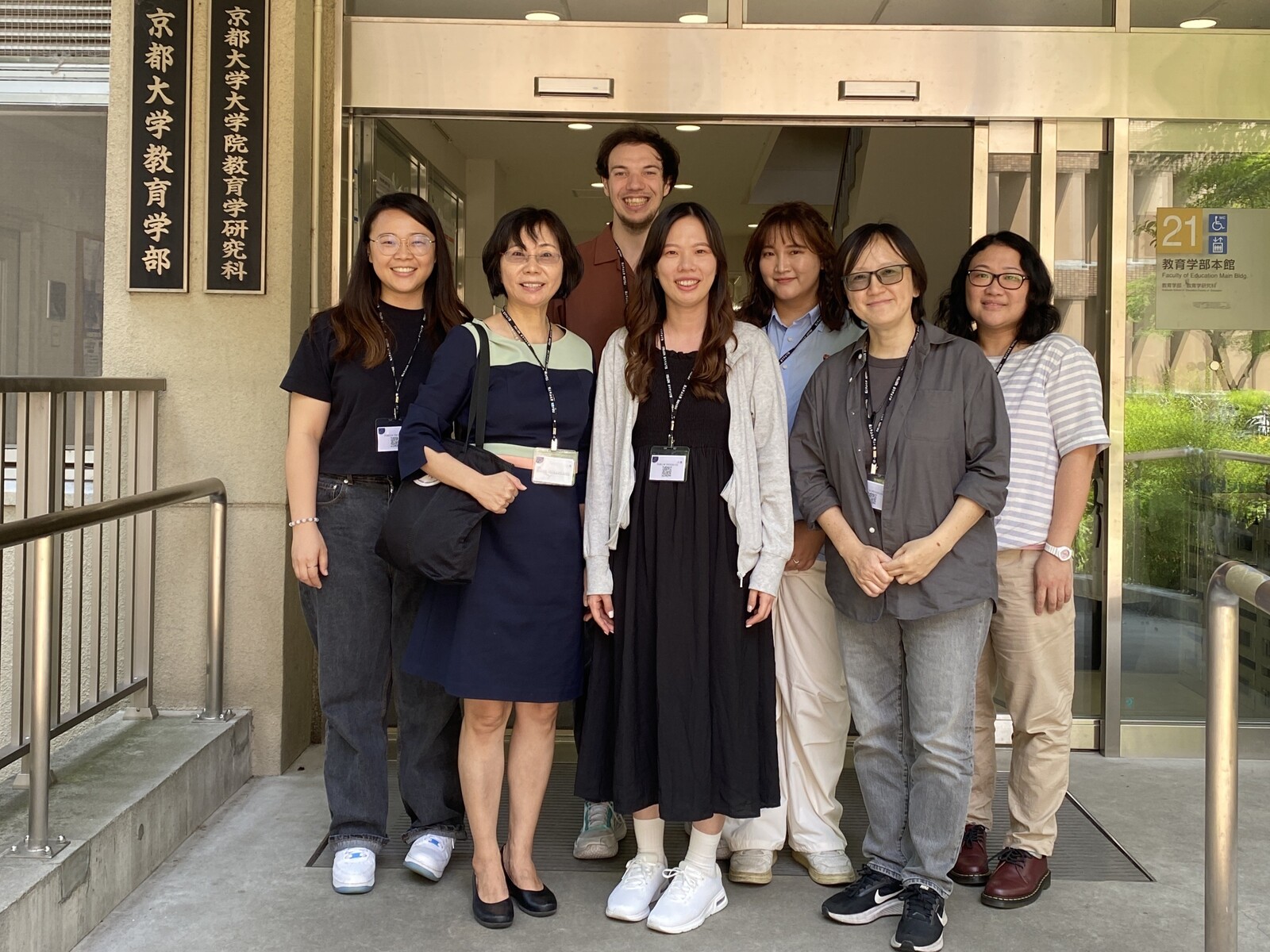 Distinguished Professor Hsueh-Hua Chuang (second from left) of the NSYSU Institute of Education poses for a photo with research team members Ju-Hui Wei (second from right) and Liang-Chen Su (third from right) during a visit to Kyoto University in Japan.Image
