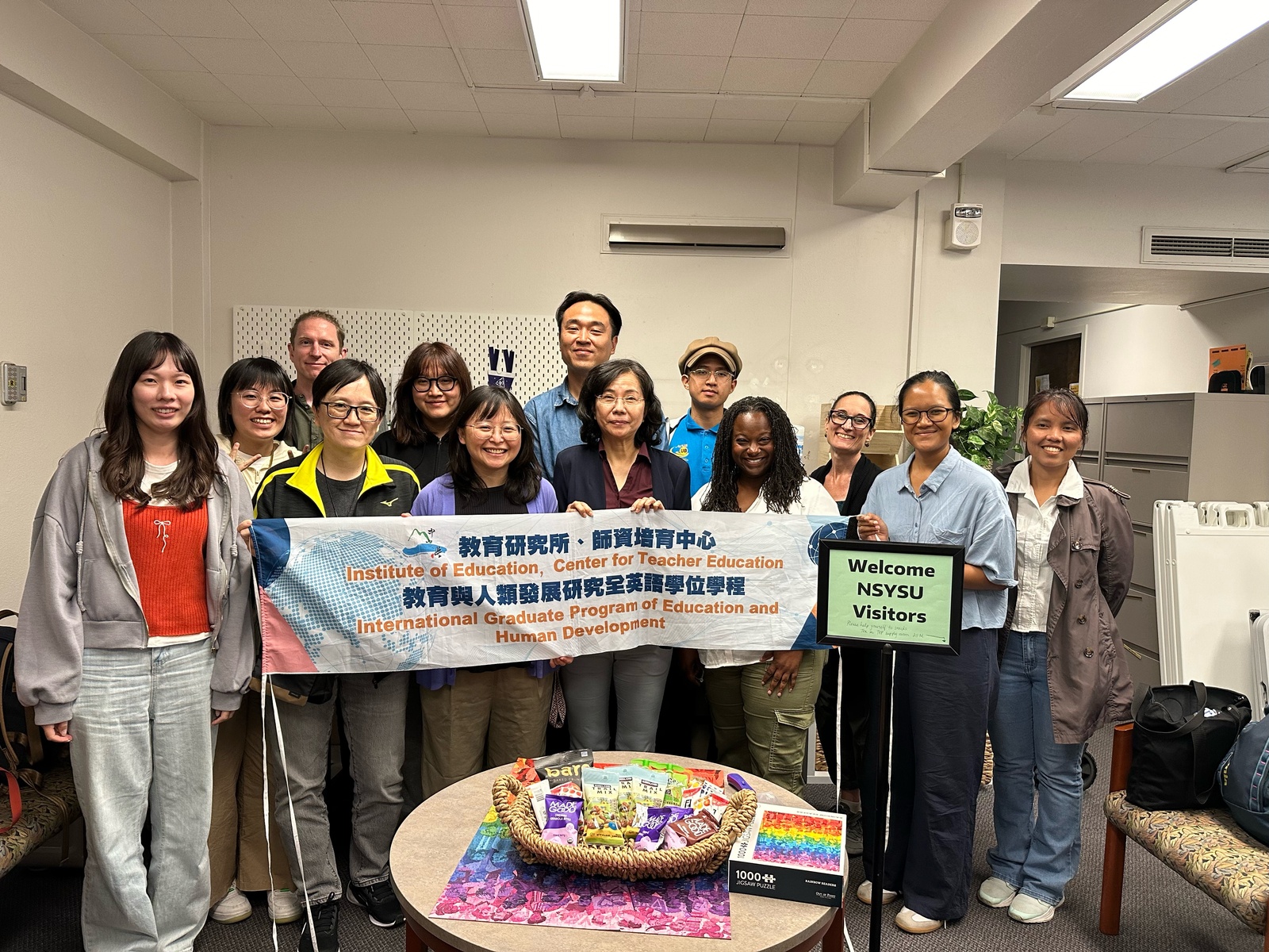 Distinguished Professor Hsueh-Hua Chuang (front row, fourth from left) poses with research team members Ju-Hui Wei (front row, second from left) and Liang-Chen Su (back row, second from left) during a visit to the University of Washington in the United States.Image