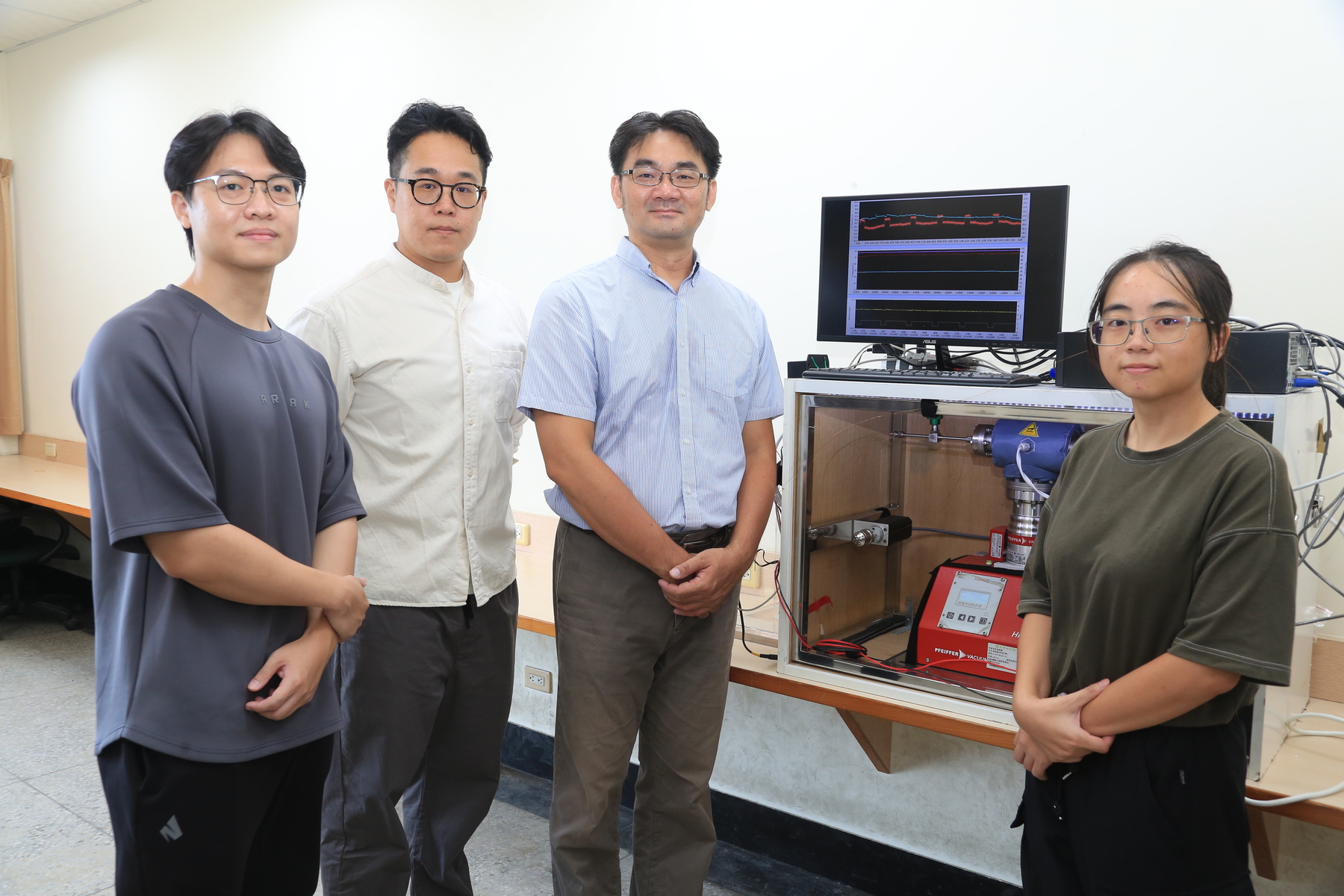The research team with the equilibrator inlet mass spectrometry.Image