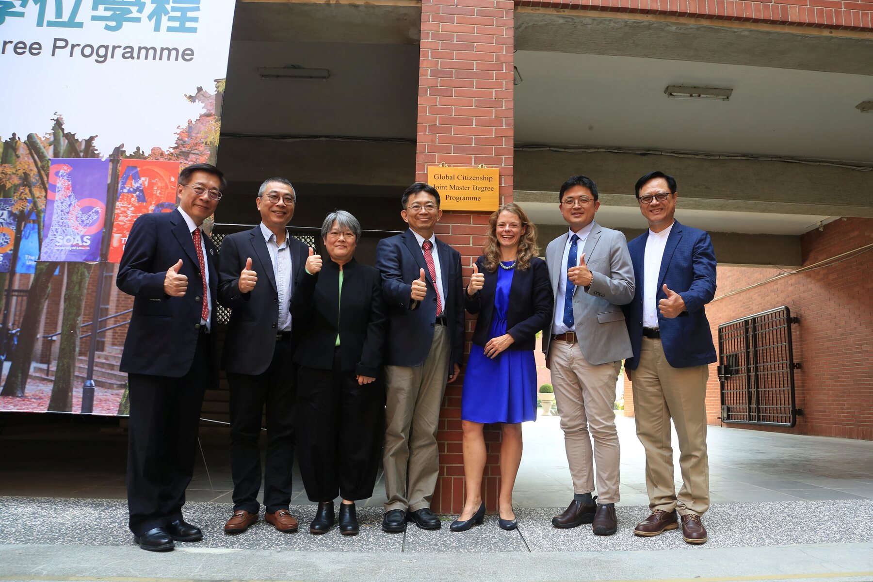 The unveiling ceremony of the "Global Citizenship Joint Master Degree Programme." From left: NSYSU Senior Vice President Bor-Ching Sheu, Senior Vice President Chih-Wen Kuo, Dean of the College of Social Sciences Mei-Hua Chen, President Chih-Peng Li, Director Natasha Harrington of the Political and Communications Section of the British Office Taipei, Chief Secretary of the Ministry of Education Po-Chiao Lin, and Chairman of HSIN BA BA Business Co., Ltd. Chung-Hui Huang.Image