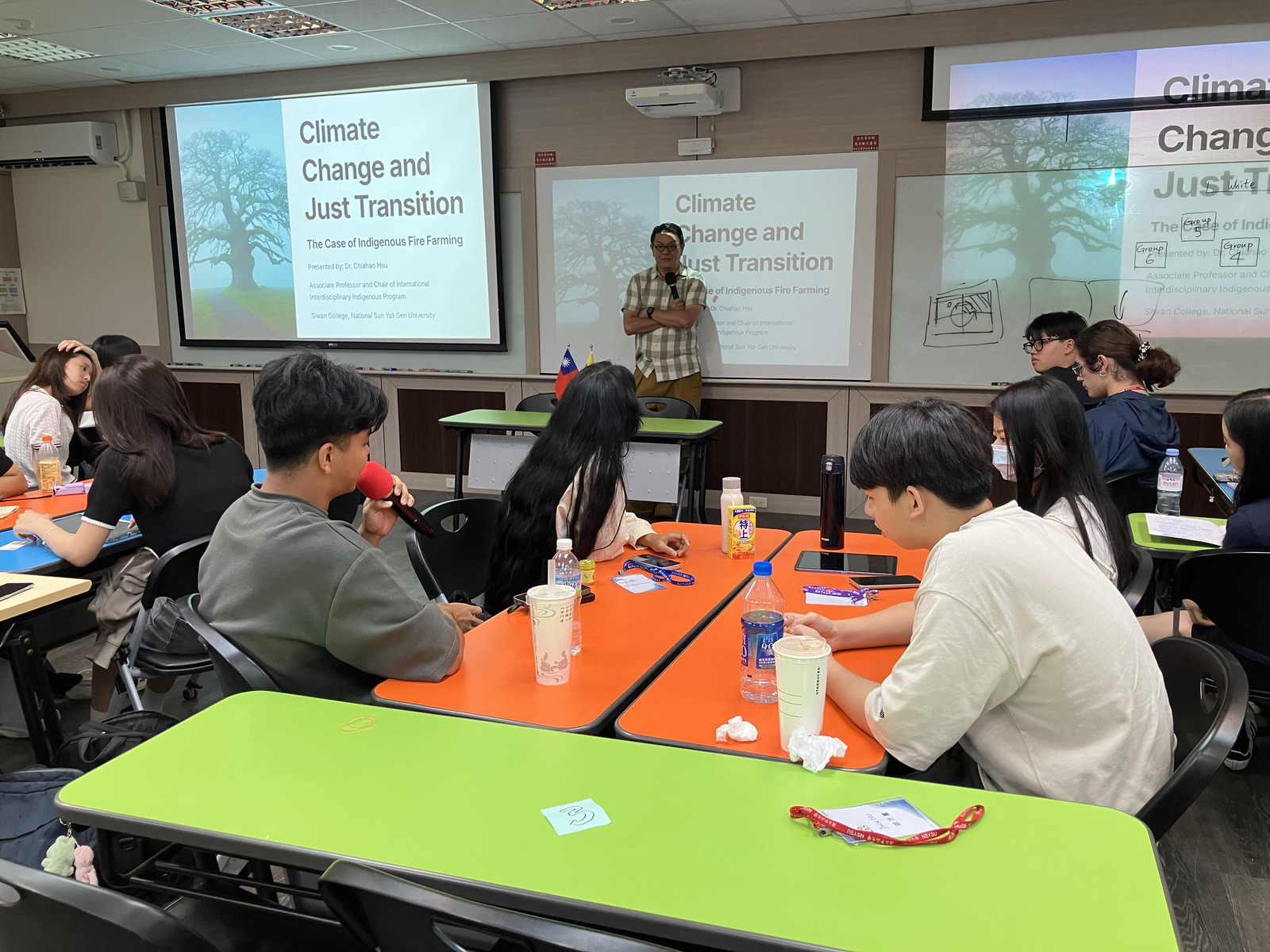 Dr. Chia-Hao Hsu, Director of the Indigenous Special Program, gives a talk on climate change and just transition.Image