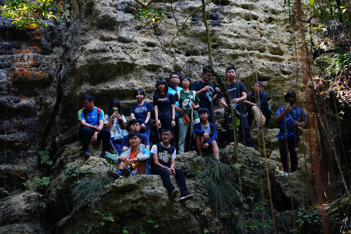 Restore our Earth: NSYSU students remove invasive species in Chaishan Mountain