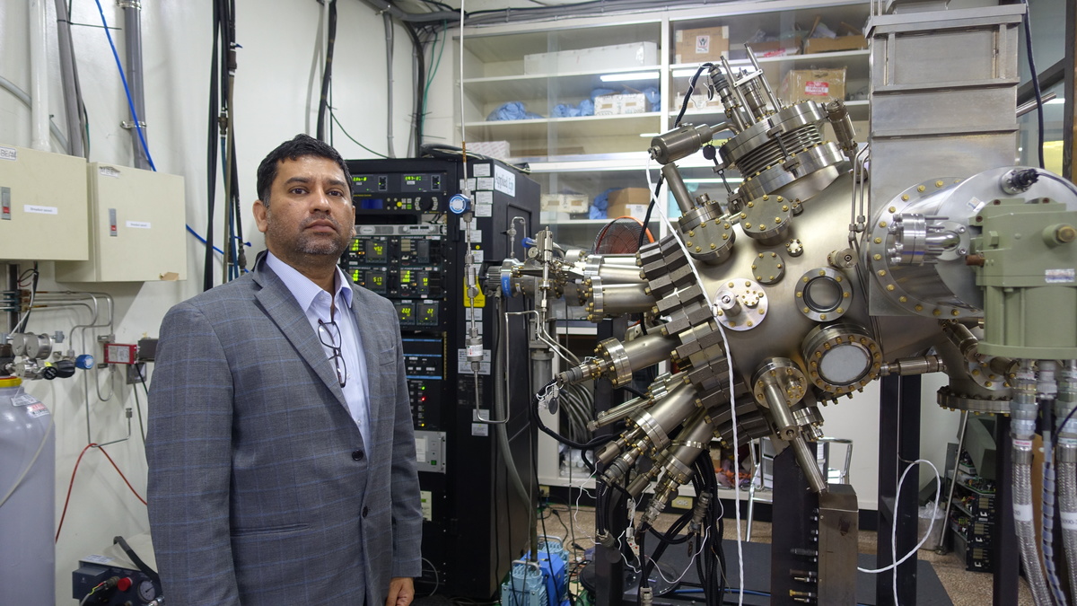 Molecular Beam Epitaxy, an ultra-high vacuum machine for growing III nitride semiconductors (on the right).